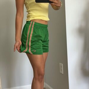 Nike Green Women's Athletic Shorts with Pink Accents
